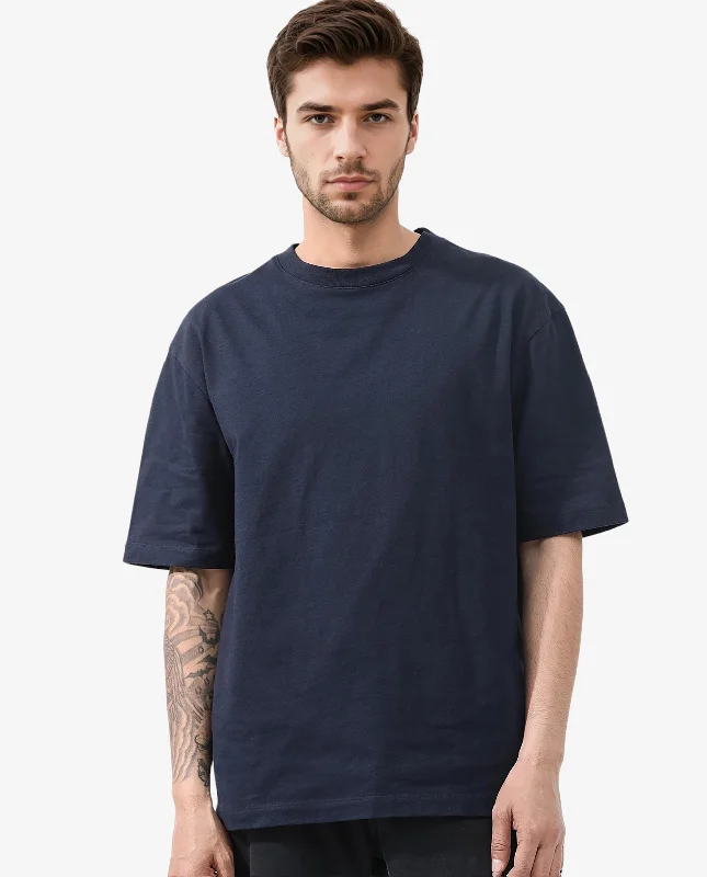 Men's Shirts with Embellished HemlinesRare Rabbit Articale Men's Dis Navy Cotton Polyester Fabric Crew Neck Oversized Fit Typography Print T-Shirt Men's Shirts with Embellished HemlinesRare Rabbit Articale Men's Dis Navy Cotton Polyester Fabric Crew Neck Oversized Fit Typography Print T-Shirt