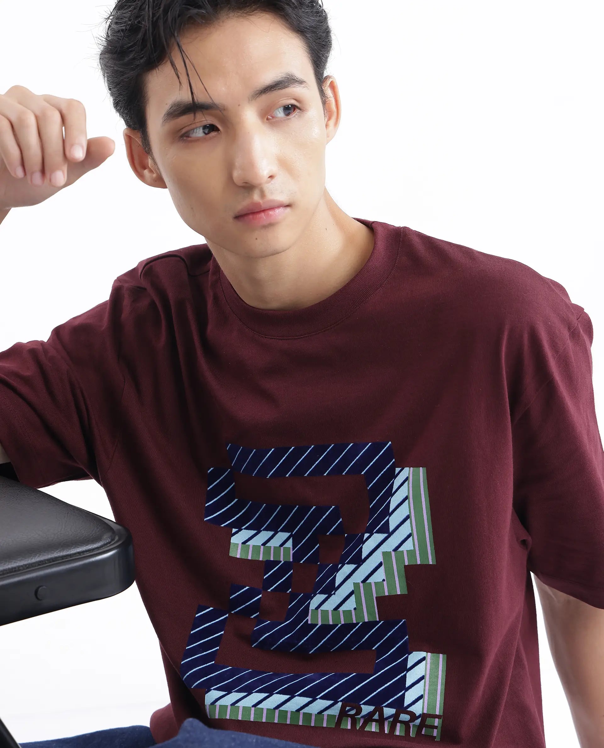 Men's Shirts with Embellished HemlinesRare Rabbit Men Zee's Maroon Cotton Fabric Short Sleeve Crew Neck Oversized Fit Graphic Print T-Shirt Men's Shirts with Embellished HemlinesRare Rabbit Men Zee's Maroon Cotton Fabric Short Sleeve Crew Neck Oversized Fit Graphic Print T-Shirt