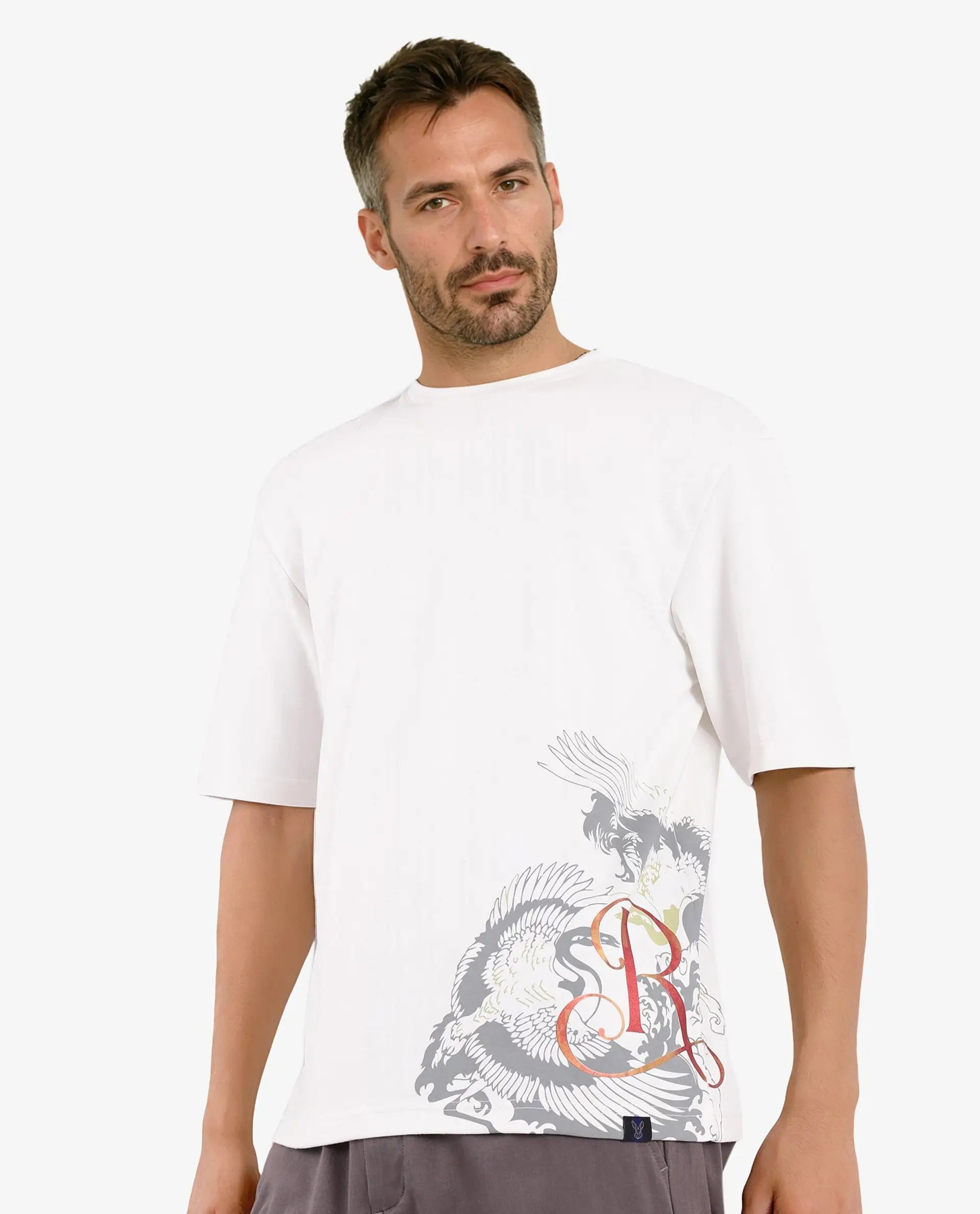 Men's Shirts with Cowl NecksRare Rabbit Men Bazy Off White Cotton Polyester Fabric Short Sleeve Crew Neck Graphic Print T-Shirt Men's Shirts with Cowl NecksRare Rabbit Men Bazy Off White Cotton Polyester Fabric Short Sleeve Crew Neck Graphic Print T-Shirt