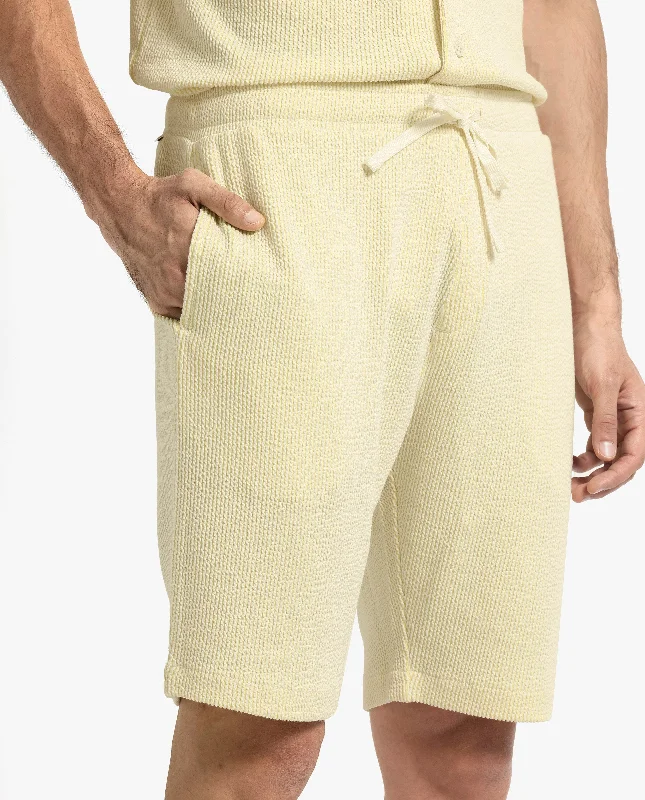 Men's Pants with Hidden PocketsRare Rabbit Men's Zavet-B Flouroscent Yellow Cotton Polyester Fabric Knee Length Regular Fit Self Stripe Textured Shorts